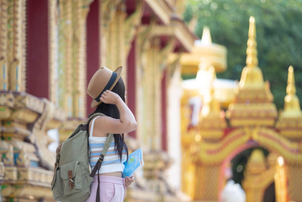 Female Tourist In Thai Temple