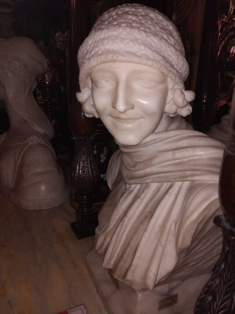 Head Statue Of Woman Smiling