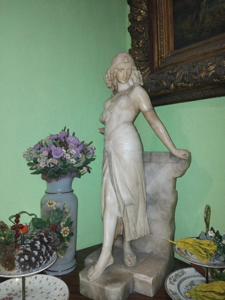 Marble Statue Of Woman In Pose