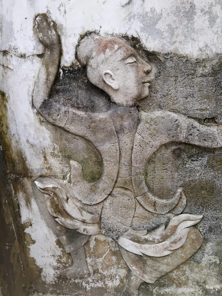 Wall Carvings On Old Temple Structure