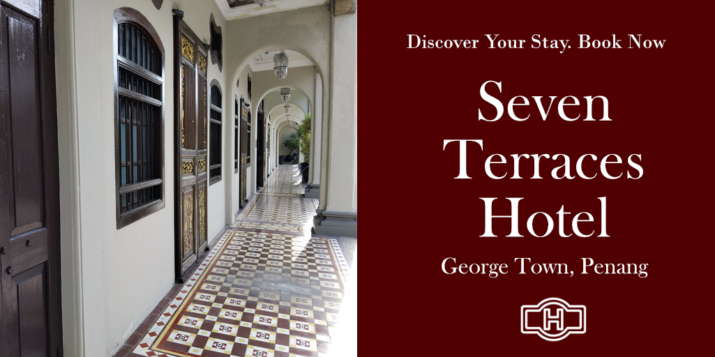 Seven Terraces Hotel corridor in George Town, Penang. "Discover Your Stay. Book Now